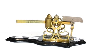 Lot 2251 - Mordan Postal Scales with ornate brass frame, flat pan with rates 1oz to 12oz (1d to 4d) and...