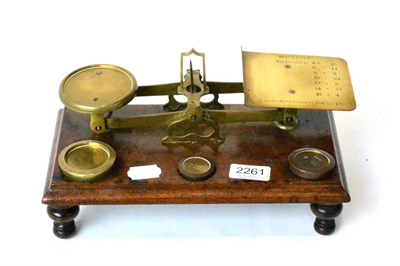 Lot 2261 - S Mordan & Co Brass Letter Scale with round concentrically recessed pan for weights and an oval...