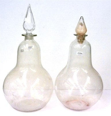 Lot 2286 - Two Large Glass Apothecary Display Jars with stoppers, in clear glass 26', 66cm high (tallest)