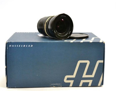 Lot 2314 - Hasselblad HC f3.5, 35mm Lens no.7AS111755, 95mm diameter, in original box with lens hood and...