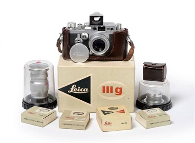 Lot 2322 - Leica IIIg Camera no.969888 with original card box and Leitz Elmar f2.8, 50mm lens no.1618160...