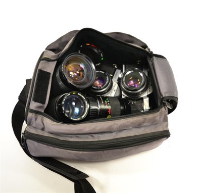 Lot 2337 - Pentax Two MX Cameras both with f2, 50mm lenses; together with four lenses: Sirius f4-5.6,...