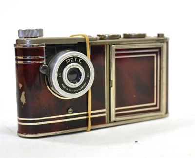 Lot 2363 - Walter Kunik Petie Vanity Camera with red enamel casing, compact with opening door and mirror...