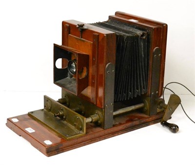 Lot 2365 - An Unusual Victorian Bellows Camera/Projector with mahogany body on heavy brass frame with...