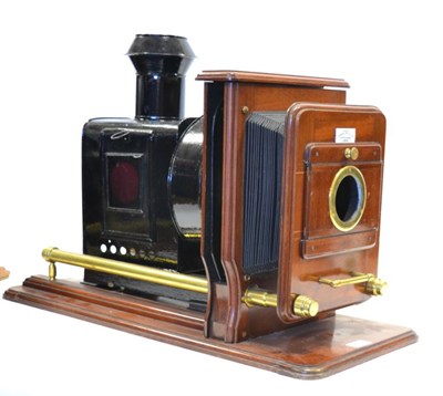 Lot 2372 - Magic Lantern in mahogany with bellows moved on telescopic rail, with non-original plaque 'Perken &