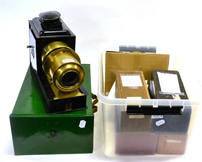 Lot 2373 - Magic Lantern with unmarked brass lens (restored) together with various glass slides including...