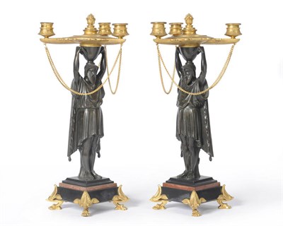 Lot 999 - A Pair of Bronze and Ormolu Figural Candlestands in Greek Revival Style, circa 1850-70, each...