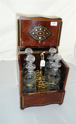 Lot 1004 - A 19th Century French Amboyna and Ebonised Liqueur Decanter Box, of slight serpentine outline,...