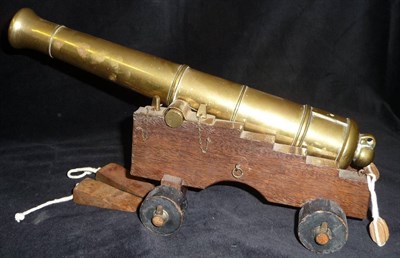 Lot 64 - A Brass Model of a 19th Century 18 Pounder Cannon, with 32cm ring turned brass barrel on a...