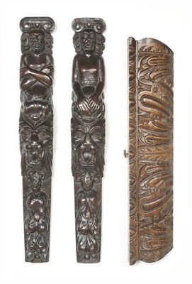 Lot 1012 - A Pair of Carved Oak Figural Pilasters, late 17th century, as bearded men with arms crossed,...