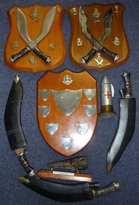 Lot 68 - Militaria, comprising:- two walnut shield shaped plaques, each mounted with a pair of crossed...