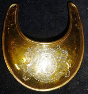 Lot 70 - A George III Officer's Brass Gorget, with folded edges, engraved with the Royal Coat of Arms...