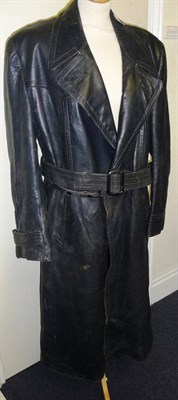 Lot 85 - A German Navy Issue Grey Leather Coat, full length, with belt fastening and quilted navy lining.