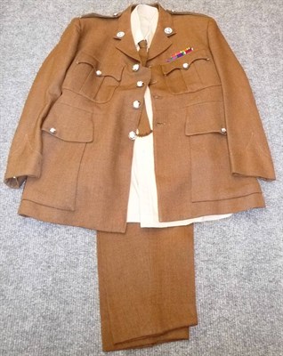 Lot 92 - A Number 2 Dress Uniform to a Major of the Royal Welsh Regiment, comprising a tunic with white...