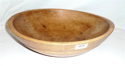 Lot 1019 - A Turned Sycamore Butter Bowl, 19th century, circular, of an attractive light honey colour and...