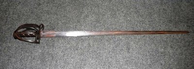 Lot 137 - A Victorian Scottish Basket Hilt Broadsword, the 83cm double edge steel blade with a short...