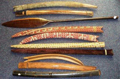 Lot 154 - A Collection of Nineteen Mainly Indian Sword Scabbards, in cloth and leather; a Mulga Wood...