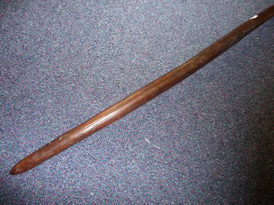 Lot 162 - An Australian Aboriginal Throwing Stick, of slender tapering form, with long vertical incised...