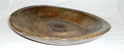 Lot 1022 - A Continental Turned and Stained Sycamore Large Circular Shallow Bowl, 19th century, externally...