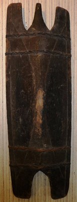 Lot 171 - An Igarot, Phillipines Dark Stained Wood Shield, of vertical rectangular form, with three prongs to