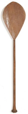 Lot 179 - An Austral Islands Wood Paddle, the back of the blade carved with bands of sunbursts and stars with