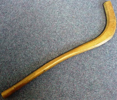 Lot 196 - A North American Indian Wood Hockey Type Stick, the flattened curved head with bevelled edges,...