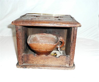 Lot 1027 - An Oak Foot Warmer, Dutch, 18th century, of rectangular section, the harebell pierced...