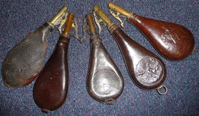 Lot 224 - A Leather Shot Flask, embossed with a gillie on horseback, with his dog, with brass charger;...