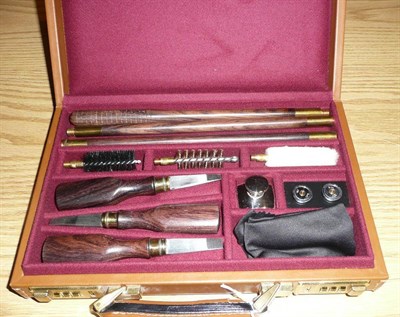 Lot 232 - A Modern Emmebi Leather Cased Gun Cleaning Kit, for a 20 bore, with rosewood three piece rod,...