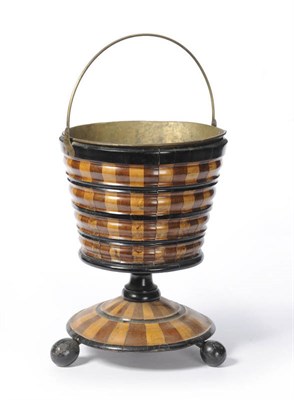 Lot 1029 - A Dutch Walnut and Fruitwood Parquetry Pedestal Charcoal Bucket, early 19th century, with brass...