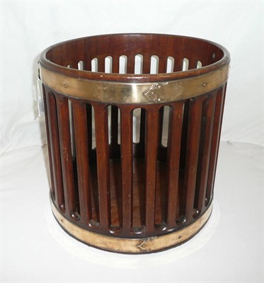 Lot 1031 - A Mahogany and Brass Bound Waste Paper Bin, of cylindrical form, the pierced border with...