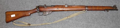 Lot 284 - A Deactivated .303 Calibre SMLE Bolt Action Rifle, numbered 42883, with webbing sling and...