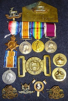 Lot 15 - A First World War Long Service Group of Four Medals, awarded to 1479 S.SJT.H.GILBERT. M.P.S.C.,...