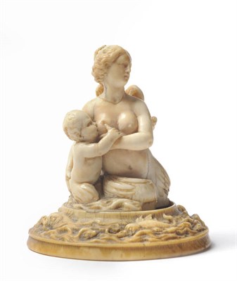 Lot 1036 - A Small Carved Ivory Group of a Nereid Suckling Her Child, perhaps French, perhaps early 17th...