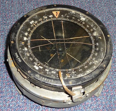 Lot 96 - A Second World War Lancaster Bomber Compass, the grey metal case set with brass label stamped...