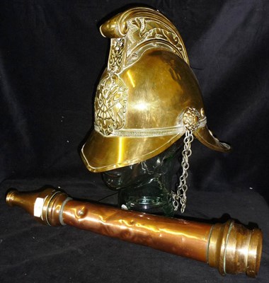 Lot 99 - A Brass Merryweather Type Fireman's Helmet, with folded rim, dragon embossed comb (dented) and...