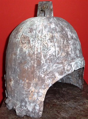 Lot 104 - A Western Zhou Style Chinese Bronze Helmet, of panelled bell shape, with angular lug finial,...