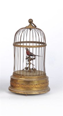 Lot 1047 - A French Singing Bird in Cage Musical Box Automaton, circa 1900, the domed wirework cage...