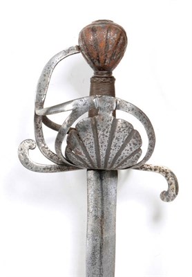 Lot 138 - An Early 17th Century English Swept Hilt Broadsword, circa 1610, the 85cm double edge steel...