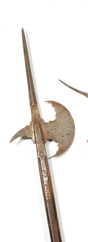 Lot 145 - A 16th Century Italian Halberd, the steel crescent shape blade, curved rear fluke and diamond...