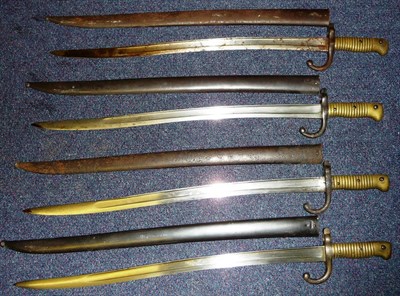 Lot 149 - Four French Model 1866 "Chassepot" Yataghan Sword Bayonets, each with a T section steel blade...