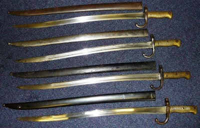 Lot 150 - Four French Model 1866 "Chassepot" Yataghan Sword Bayonets, each with a T section steel blade...