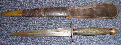 Lot 218 - A Fairbairn-Sykes Second Pattern Fighting Knife, with drop forged steel blade, plain blued...