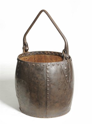 Lot 1056 - A Large Riveted Iron Cauldron, with arched swing handle, 61cm diameter, 73cm high (excluding...