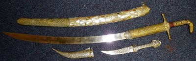 Lot 232 - A Late 19th Century Indo/Persian Sword, with 68cm plain single edge curved steel blade, the...