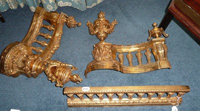 Lot 1058 - A French Gilt Brass Fire Fender with Adjustable Chenets, late 19th century, each balustraded...