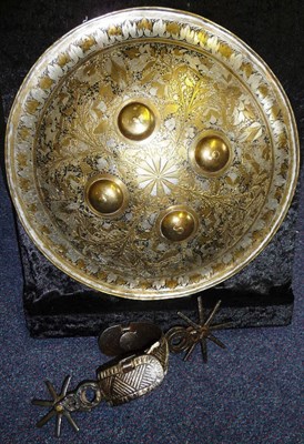 Lot 252 - An Indian Dhal, of convex circular form,engraved and inlaid with silver foliage, with four...