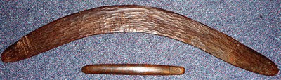 Lot 254 - A Western Australian Aborigine Hunting Stick (Boomerang), slightly flattened on one side, each side