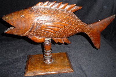 Lot 257 - A Pitcairn Islands Carved Wood Model of a Fish, on a rectangular stand, 38cm long, 23cm high; a...