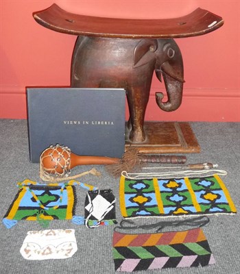 Lot 281 - An Ashante, Liberia Chief's Wood Stool, carved from one block of wood, with curved rectangular seat